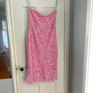 Pink sequins strapless prom or special occasion dress.